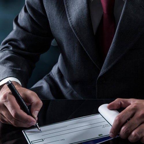 Identificazione del portatore di assegno di traenza e responsabilità della banca